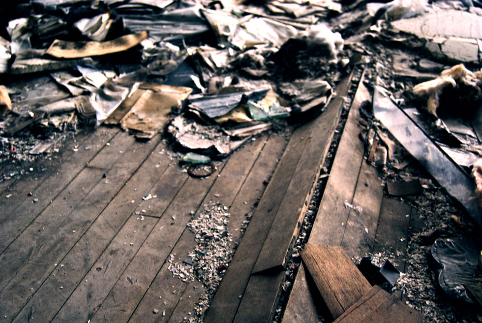 The wooden floorboards moved in waves across the warehouse, sometimes rising up several feet.