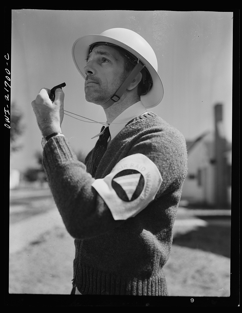 Mr. Babcock is an air raid warden [PHOTO: Library of Congress]