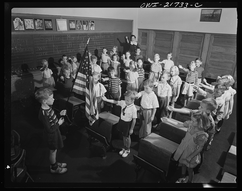 Earl Babcock's school day begins with the salute to the flag [PHOTO: Library of Congress]