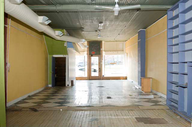 The interior of 1796 East Avenue... Former Cyrus Oriental Rugs. [PHOTO: Andy Olenick, Rochester Public Library]