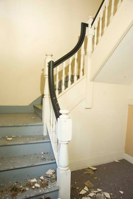 The second floor at 1800-1802 East Avenue. The stairway to attic. [PHOTO: Andy Olenick, Rochester Public Library]