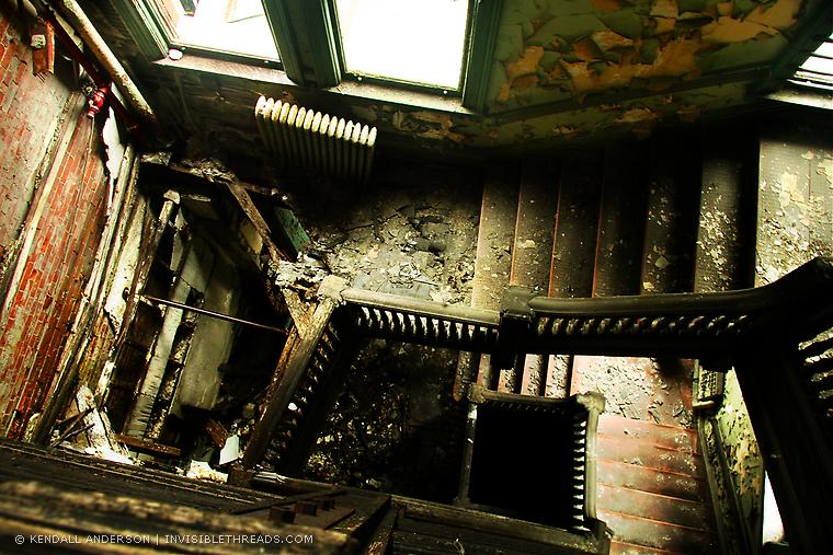 A partially collapsed stairwell in the former Bethlehem Steel North Office Building, Lackawanna, NY. [Photo: Kendall Anderson, Invisiblethreads.com]