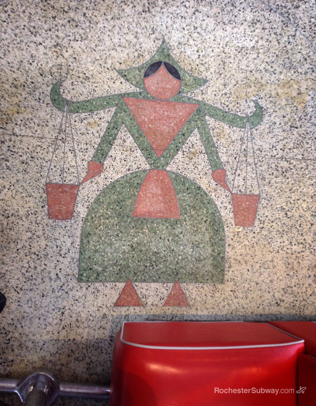 An Art-Deco style milkmaid is depicted in the floor of Donuts Delite, Rochester NY. [PHOTO: RochesterSubway.com]