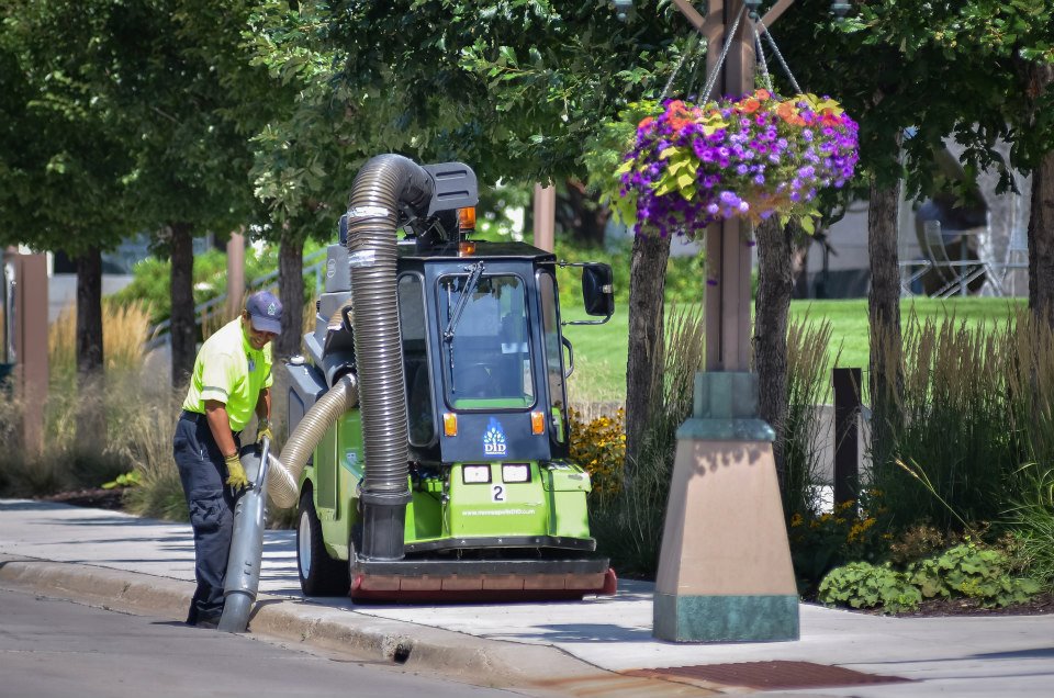 Ambassadors with the Minneapolis Downtown Improvement District provide a variety of services including street cleaning and beautification, providing information, and security. [PHOTO: MinneapolisDID.com]