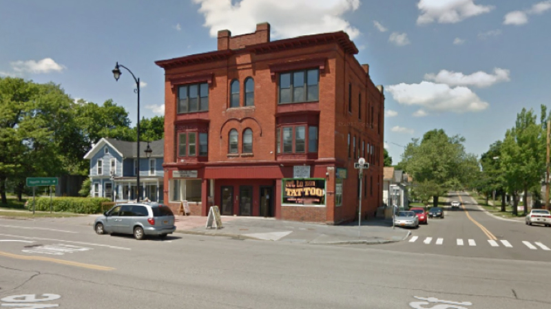 Denker looks to a nearby building. Three stories of excellent!