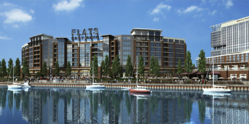 These lots would easily support a building shaped like the Flats East Bank development in Cleveland. Parking would be provided on the first and second floors, with commercial space fronting Lake.