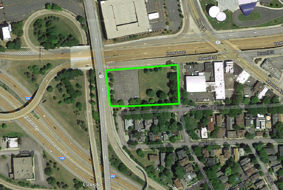 We wouldn't be filling in the green space, just the parking lot adjacent to it. About a 149x183 foot lot.
