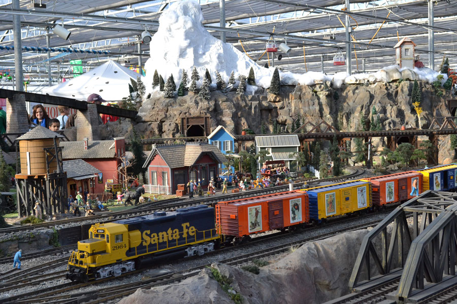 This model railroad display at the Garden Factory features three trolleys and four loooong trains; over 100 train cars in all.