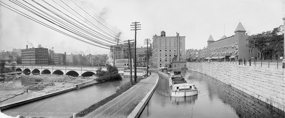 The Johnson Seymour mill race and the Erie Canal, c.1904. The towpath runs between them. In August of 1902, the body of Laura Young, 23, was found in the mill race. The cause of her death remains largely a mystery to this day. [PHOTO: Library of Congress]
