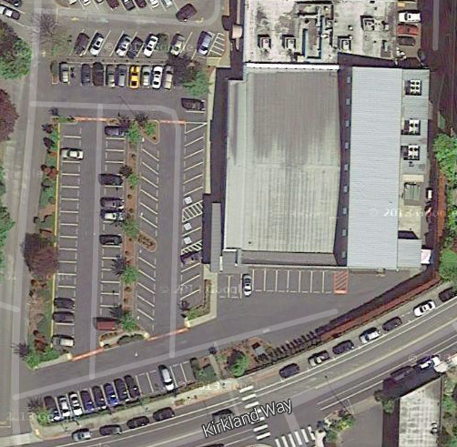What's on the site right now? A 1-story office building with a much larger parking lot!