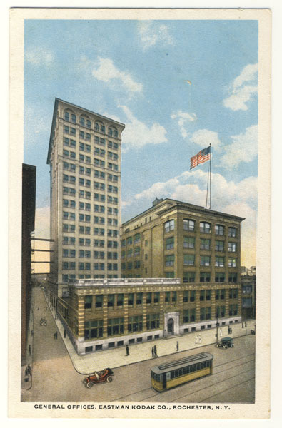 A postcard showing how Kodak Tower looked originally with 16 stories and a flat roof. This view shows an early building in front of the tower, designed around 1899 by renowned local architect J. Foster Warner. Unfortunately this building was razed in the 1950s.