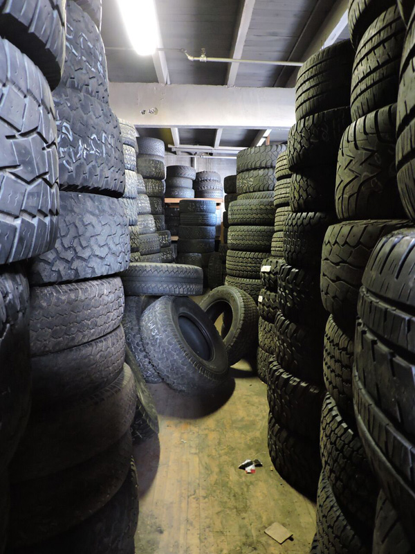 There are literally tires EVERYWHERE in this place. Every office, every room and packed to the rafters. [PHOTO: Joanne Brokaw]
