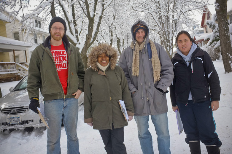 On Saturday, February 6, the day after a snow storm, 16 canvassers joined Mary to visit her neighbors with her petition. [PHOTO: Julie Gelfand]