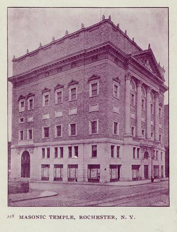 An earlier photo of the Temple. Large stones adorn the cornice of the building. [IMAGE: Rochester Public Library]
