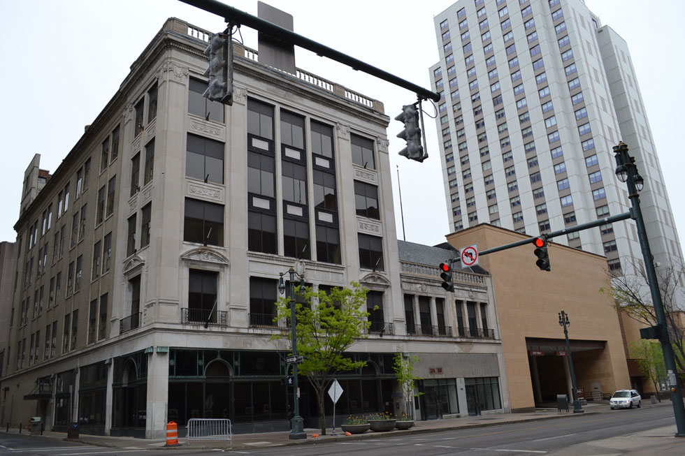 The Hilton hotel chain is strongly considering adapting this five-story former National Clothing Store on Main Street into a Hilton Garden Inn. [PHOTO: Rochester Public Library]