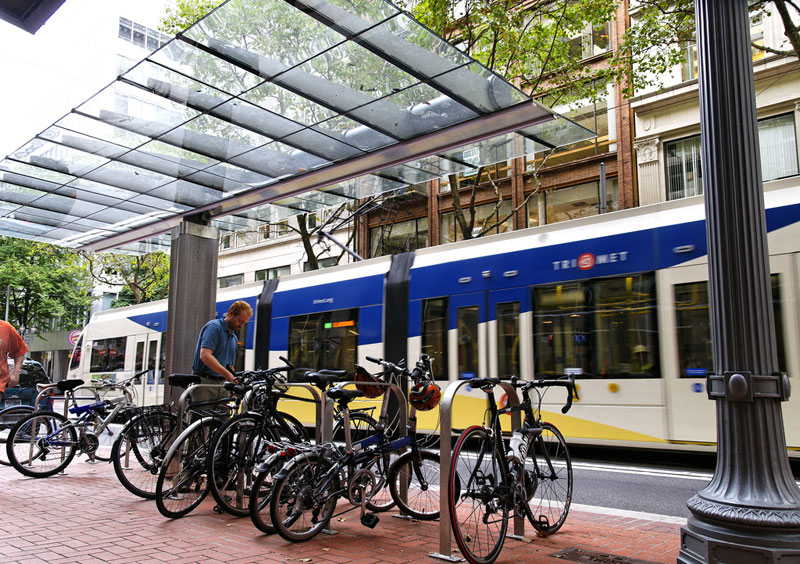 Bus routes and streetcar lines converge on Portland's transit mall. Bikes, autos, buses, and streetcar share these streets and the area is referred to as Portland's living room because of the constant activity.