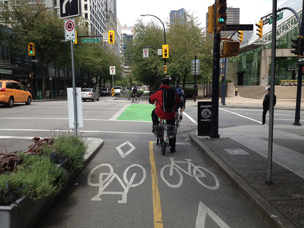 Harvey Botzman, a local cycling advocate, is calling for protected bike lanes for the full length of Main Street in Rochester. [PHOTO: San Francisco Bicycle Coalition, Flickr]