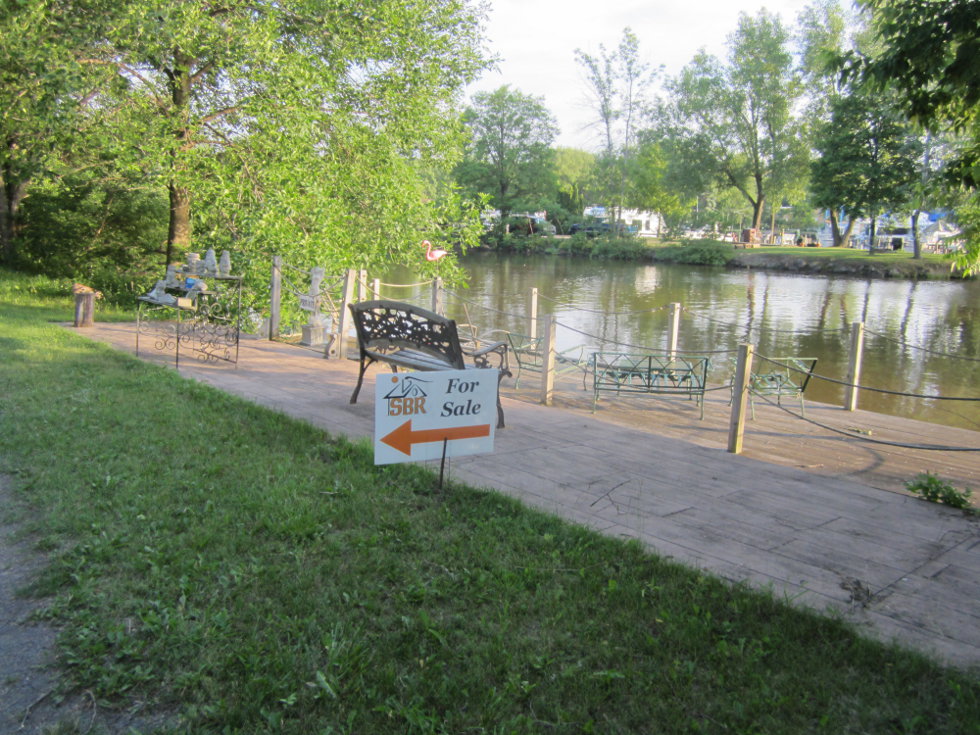 A yard sale and property advertised along the canal trail? I am often surprised as to what I find on this path. [PHOTO: Ryan Green]