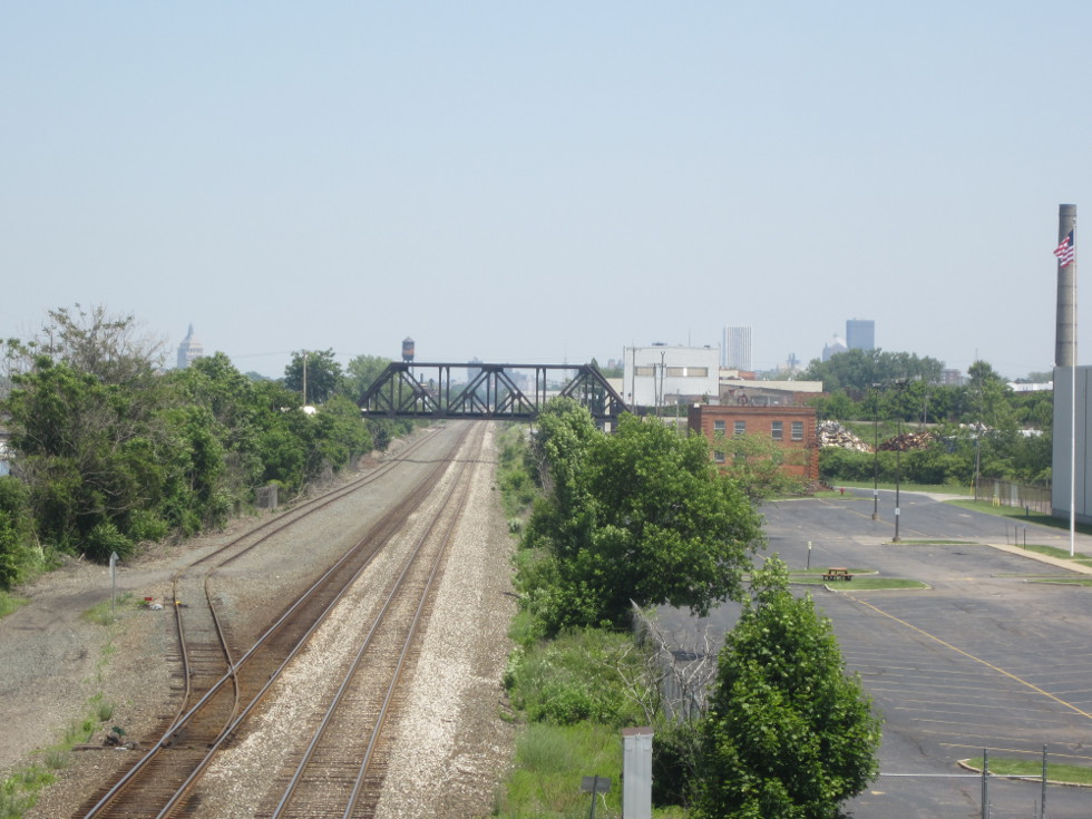 Looking East, we can see the city in the distance. We are high over the tracks, and even higher over the canal.  [PHOTO: Ryan Green]