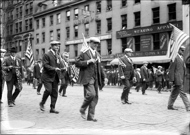 Brewery Union members holding American flags march down Main Street East in the 1919 Rochester Labor Day Parade. [PHOTO: Albert R. Stone Collection]