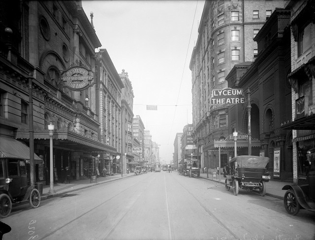 The Seneca Hotel (right) on Clinton Avenue with the Temple and Lyceum Theatres in the foreground. [PHOTO: Albert R. Stone Collection]