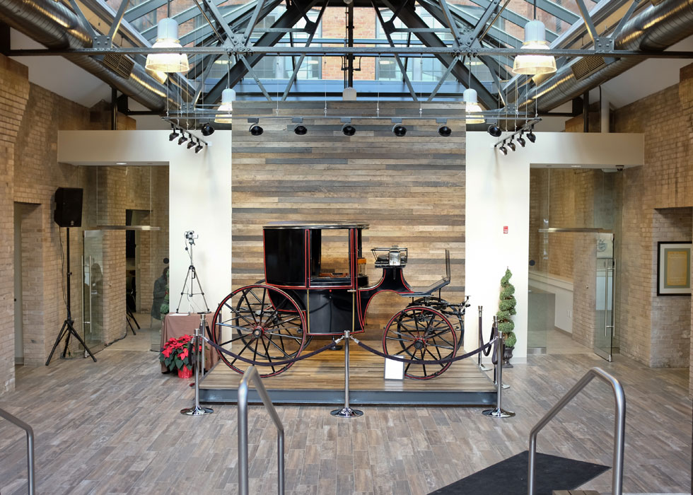 An original Cunningham carriage is now on display here in the atrium. [PHOTO PROVIDED BY: Preservation Studios]