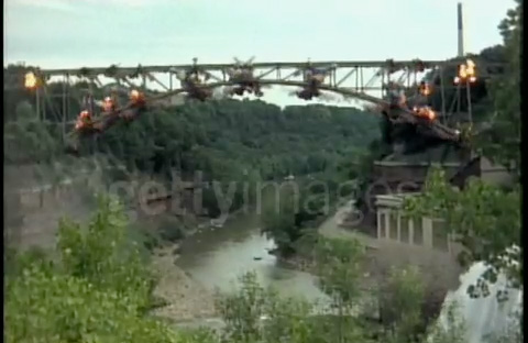 A still frame from video of the Driving Park Bridge demolition. [VIDEO STILL: Getty Images]