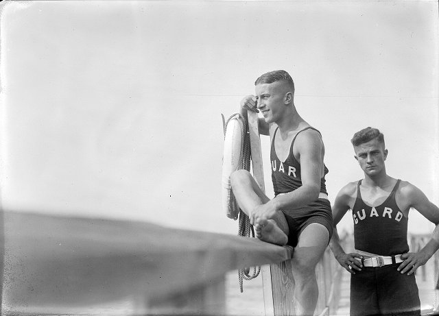 Lifeguards Roy Ackerman and Bud Martin are shown on duty at the beach at Durand-Eastman Park. August, 1921. [PHOTO: Albert R. Stone]