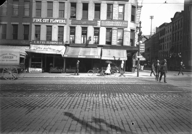 Shops on Rochester's Main Street at Water Street. August 23, 1900. [PHOTO: Rochester Municipal Archives]