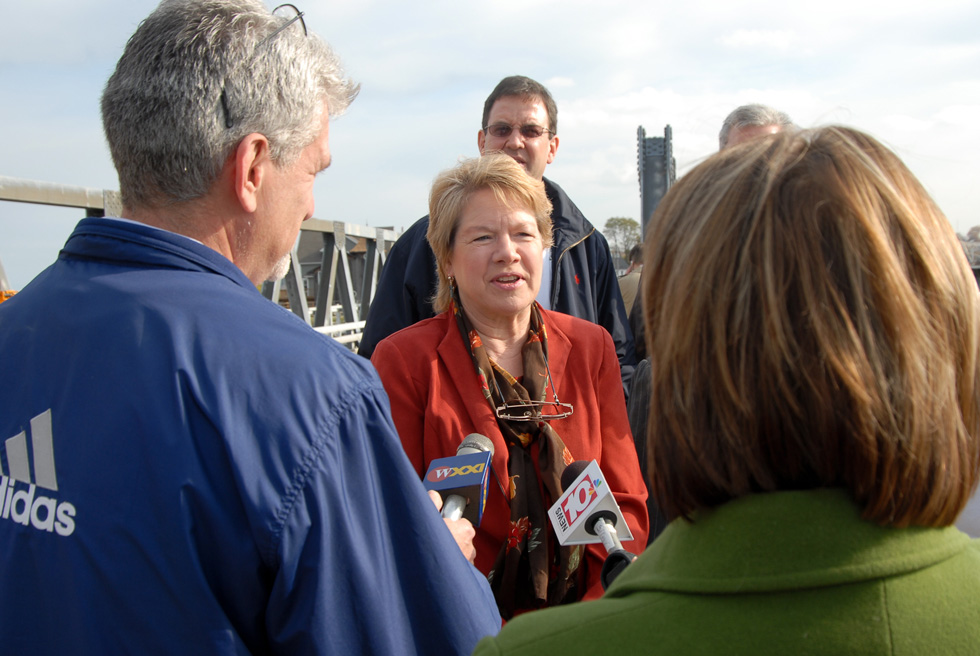 Local representatives have been calling for a fix to the bridge problem for years.  Here, then Monroe County Legislator Stephanie Polowe-Aldersley again raised the issue at the November 1 opening bridge reopening back in 2006. [PHOTO: Clarke Conde]