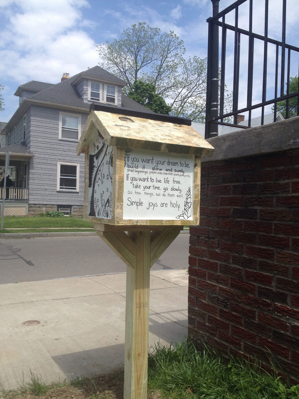 A Little Free Library at 125 Caroline Street. Rochester, NY. [PHOTO: Deanna Varble]