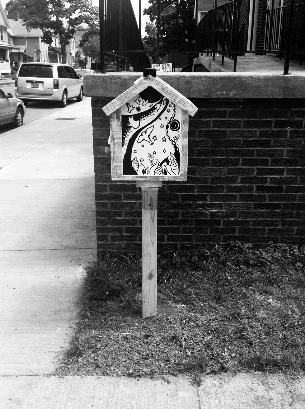A Little Free Library at 125 Caroline Street. Rochester, NY. [PHOTO: Deanna Varble]