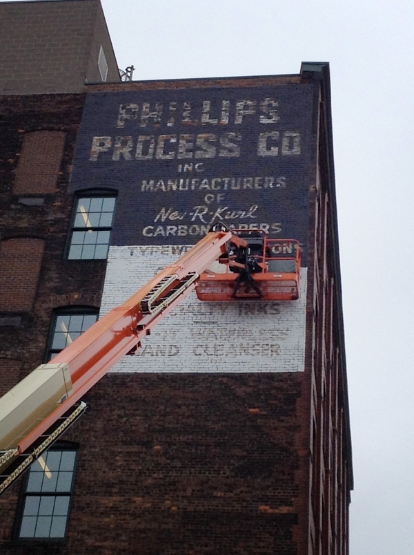 The High Falls Business Association has been repainting some of the old 'ghost' advertising signs on buildings along Mill Street. [PHOTO: RochesterSubway.com]