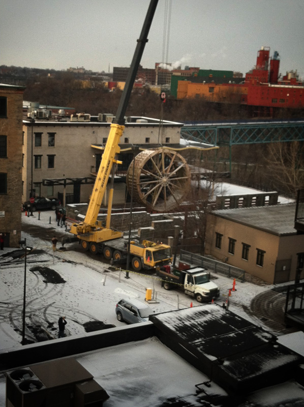 The triphammer water wheel in High Falls, Rochester NY being removed from its housing so it can be restored. [PHOTO: Peter Simpson]
