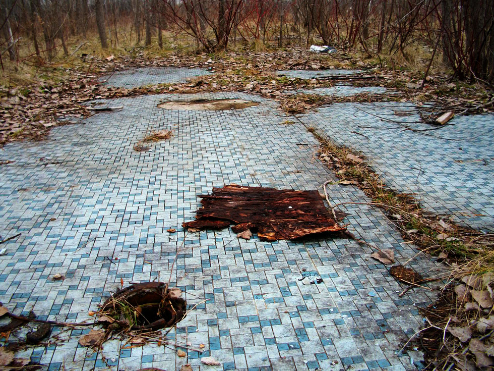 The last surviving remnant of the old theater is this tiled bathroom floor. [PHOTO: RochesterSubway.com]