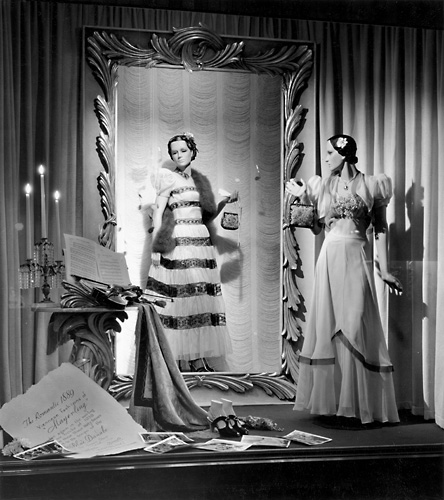 'The Romantic 1889 Viennese Fashions of 'Mayerling'' This scene shows mannequins in evening gowns. c.1940. [PHOTO: Rochester Public Library]