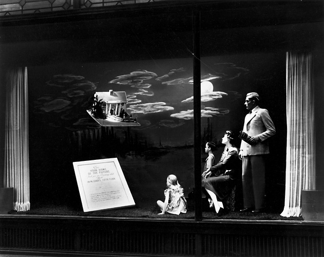 'See your home of the future that you are dreaming about now.' This scene shows a family looking into the sky at a dream home. c.1940. [PHOTO: Rochester Public Library]