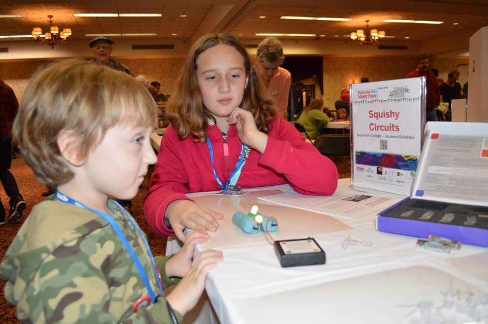 Squishy Circuits teaches circuitry to kids. They can use play-dough to make lights light up. [PHOTO: Ella's Mom]