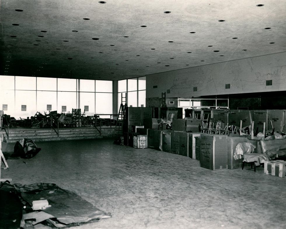 Inside the terminal, an outline of the mural can be seen on the wall above the doors. [IMAGE: Rochester Public Library Local History Division]