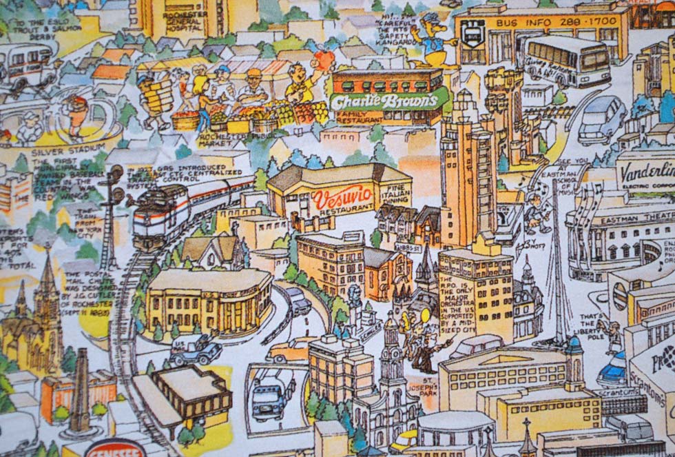 The Liberty Pole, Eastman Theater and the Rochester Public Market. See the old Silver Stadium in the upper left? This puzzle was produced in 1992. The Red Wings moved to Frontier Field in 1997.