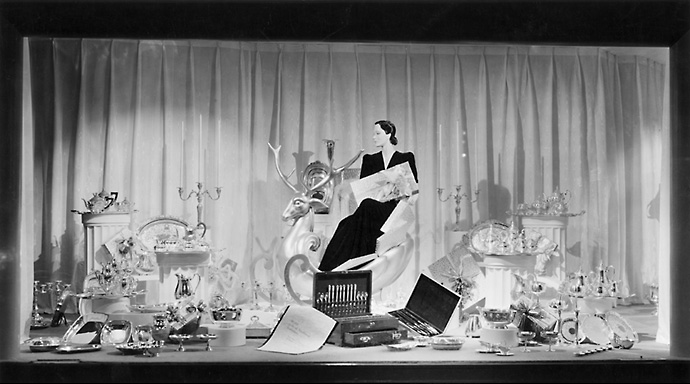 A Sibley's window display at Christmas time showing an array of silverware. 1940. [PHOTO: Rochester Public Library]
