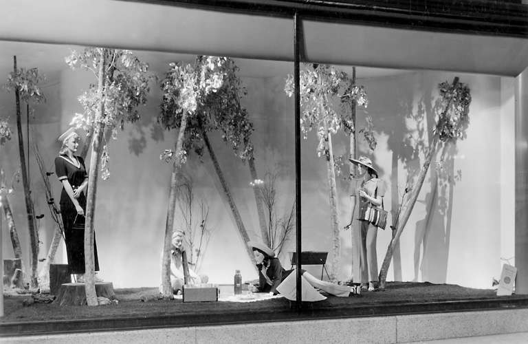 A Sibley's window display showing mannequins in fashionable clothing in a picnic setting. 1941. [PHOTO: Rochester Public Library]