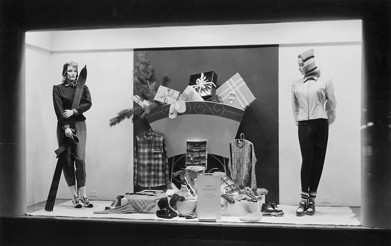 A Sibley's window display at Christmas, featuring mannequins in skiwear and showing other winter outerwear as well. 1940. [PHOTO: Rochester Public Library]