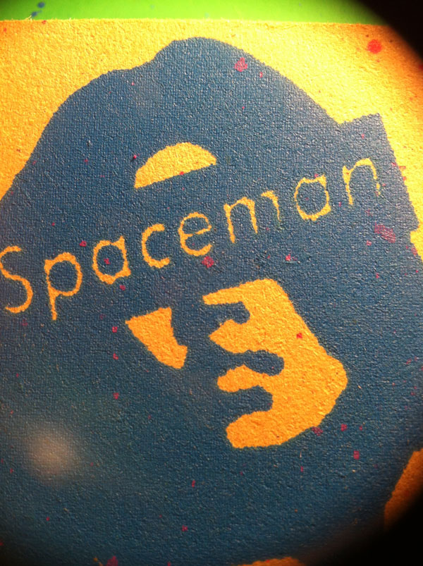 Spaceman print on yellow.