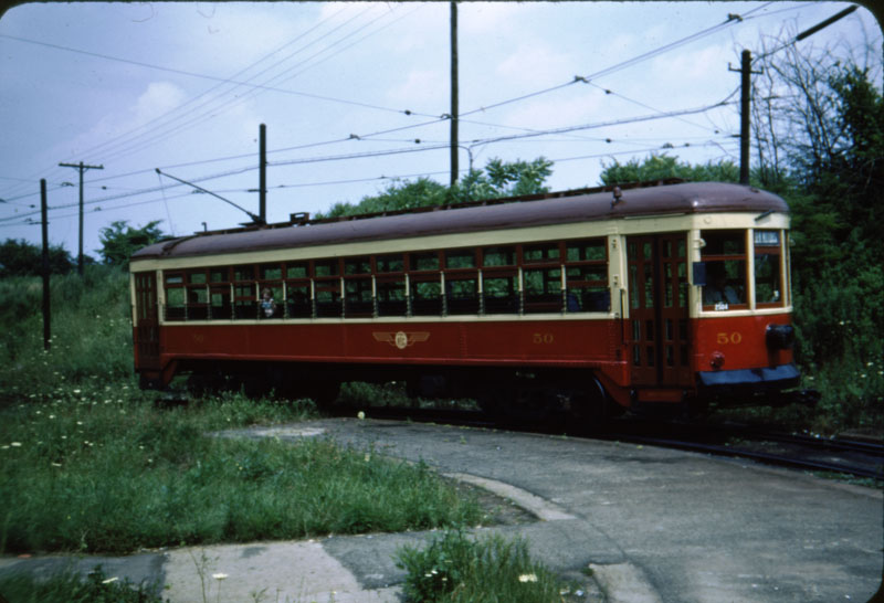 Red and cream colored Rochester Subway car 50 at Rowlands Loop, 1951.