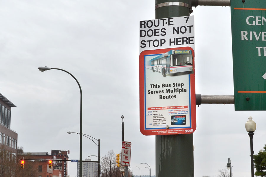 An existing RTS bus stop sign at South Avenue and Court Street. At least 14 different routes stop here. But the only thing this sign tells me is that Route 7 does not stop here. That's a problem.