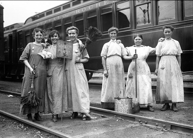 Six unidentified female railroad workers pose at Lincoln Park Station. The railroad line is the Buffalo, Rochester and Pittsburgh Railway Company. In 1917-1918, many jobs traditionally held by men were filled by women, while the men served in the Armed Services in World War I. [PHOTO: Albert R. Stone Collection]