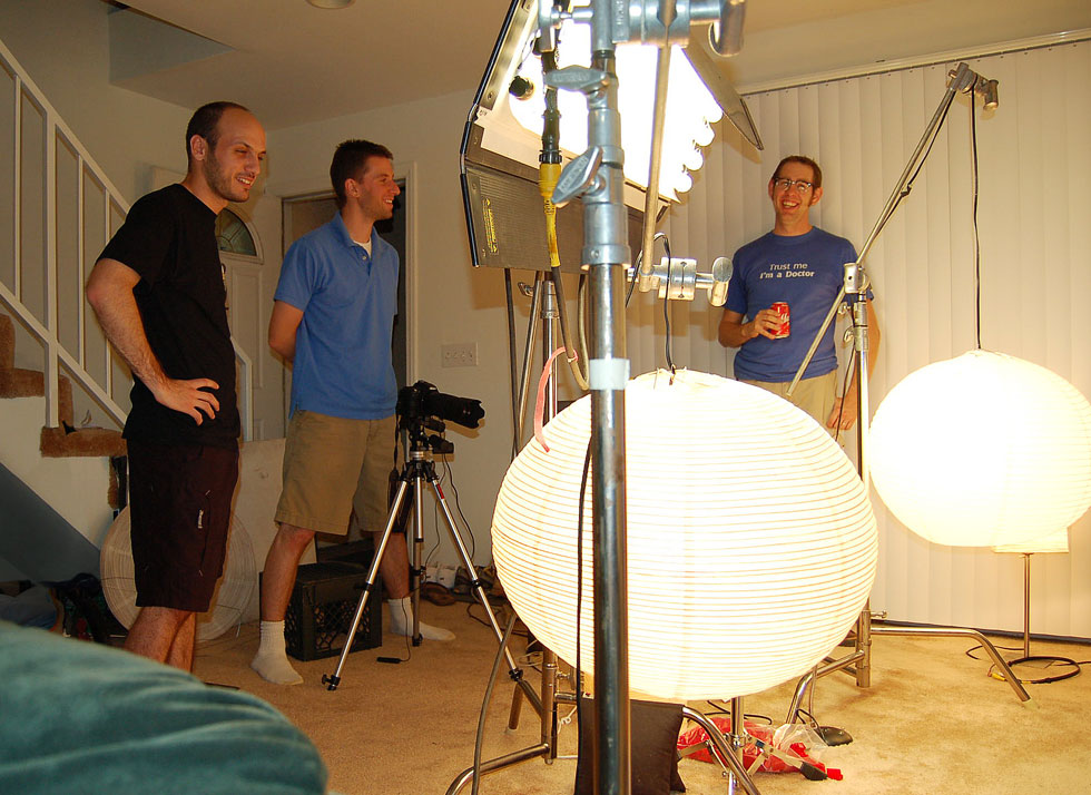 In the living room of Mike Battle's old apartment in Burbank, CA. Mike (left) with friend Scott Zarzycki, and P.J. Gaynard shooting The Simpsons LEGO couch gag. [PHOTO: Patrick Garney]