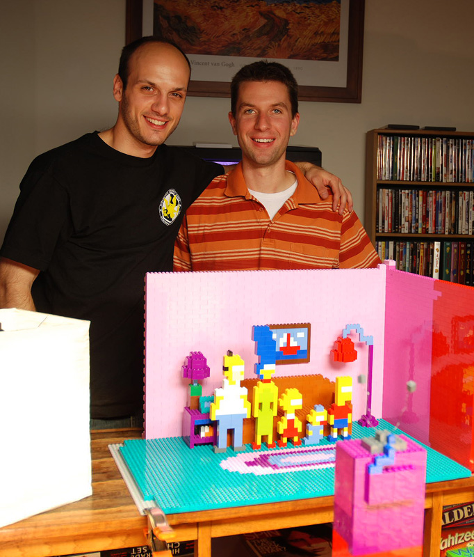 Mike Battle and friend Scott Zarzycki together with The Simpsons LEGO couch gag set.
