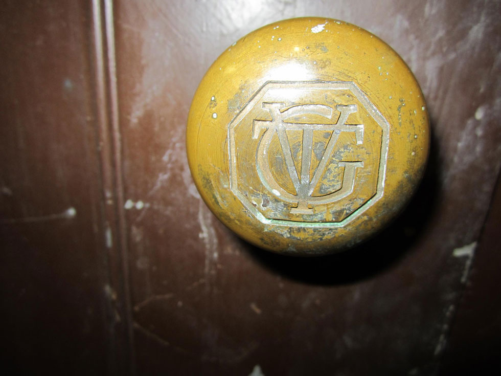 A doorknob with the letters GVT-Genesee Valley Trust. [PHOTO: Ryan Green]